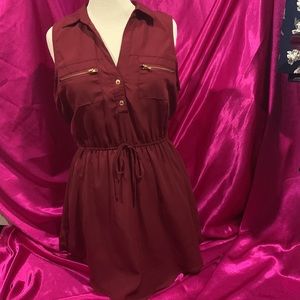 Justify size Large, burgundy sleeveless dress with waist tie. Like new. …